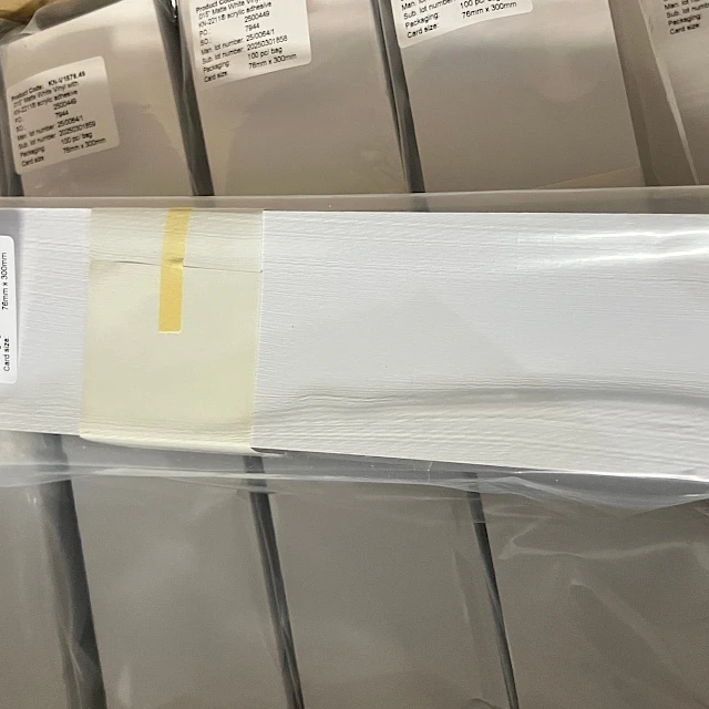 Bagged white card stack on packed bundles