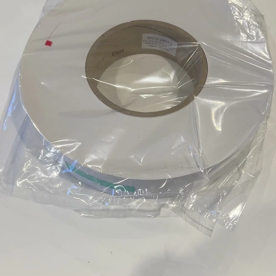 Bagged white tape roll on white table
