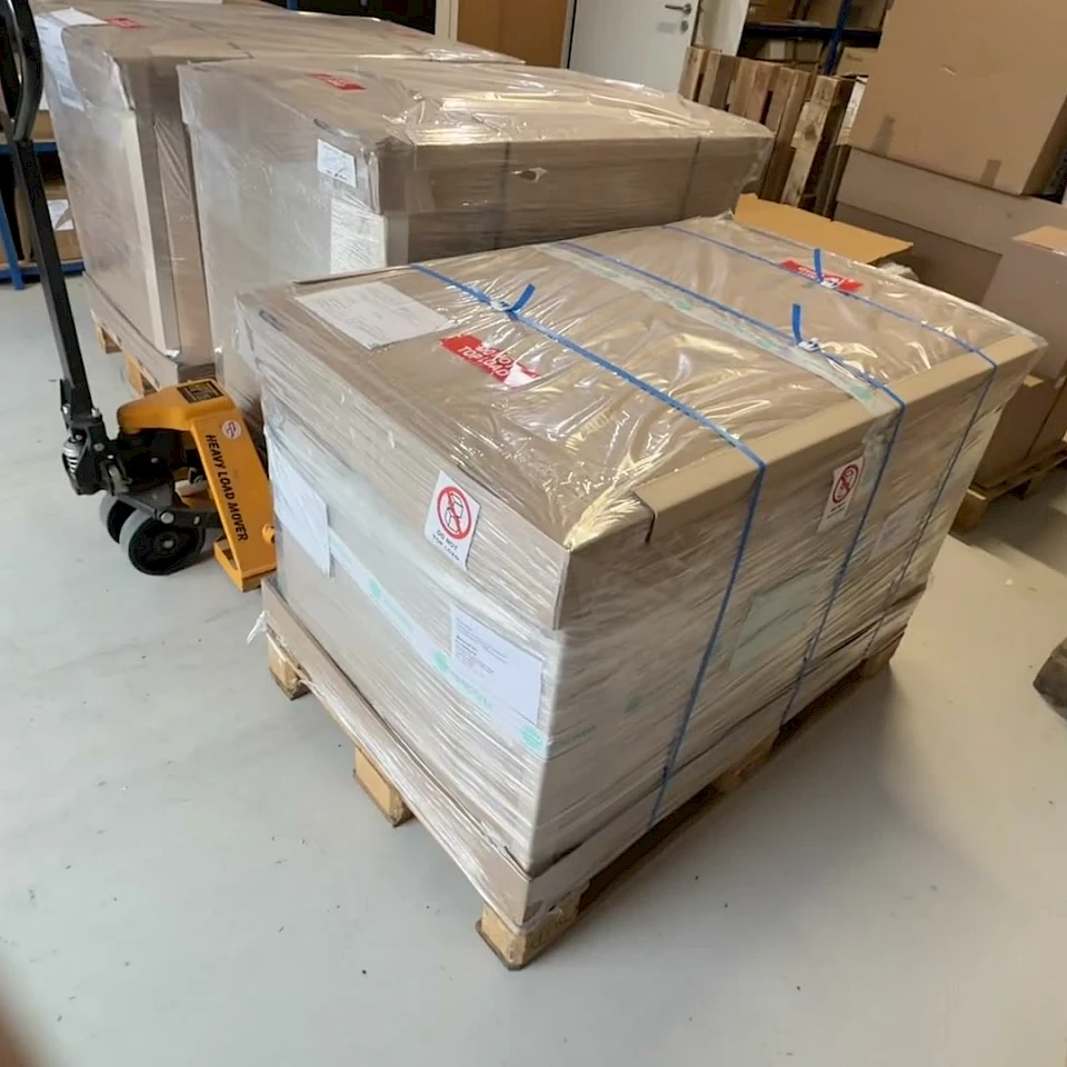Banded carton pallet on pallet truck