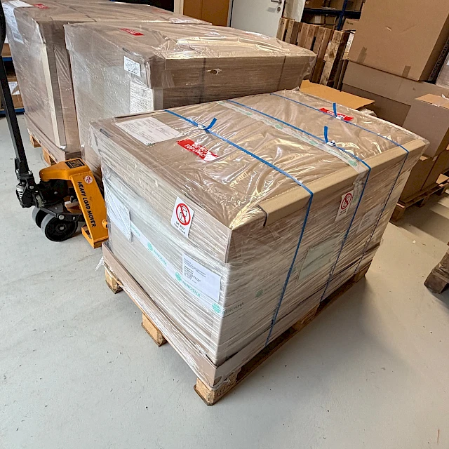 Banded carton pallet on pallet truck
