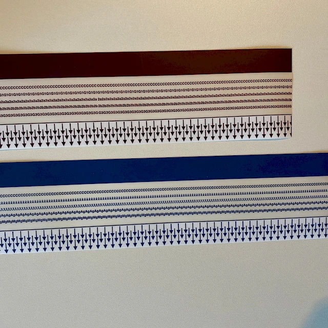 Blue and brown arrow printed strips side by side
