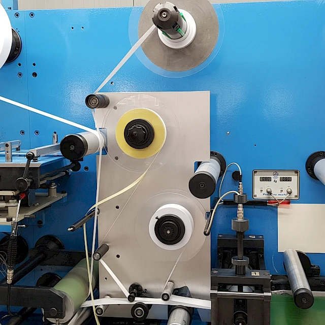 Blue converting machine unwind rolls and controls