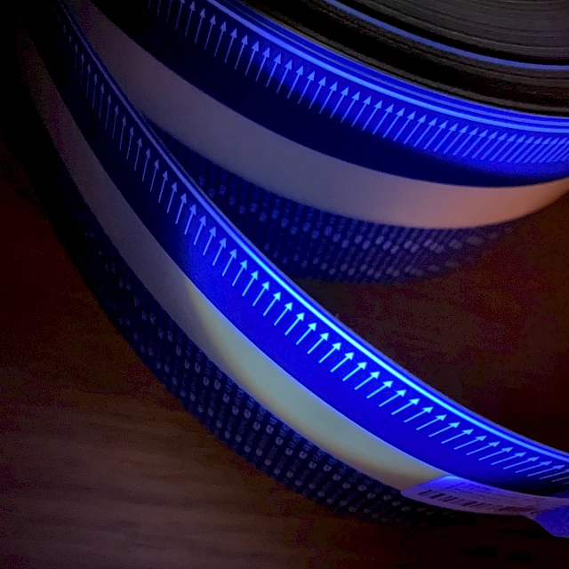 Blue fluorescent printed tape under UV light