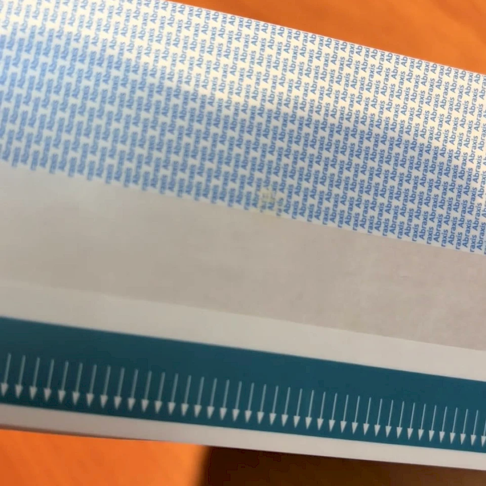 Blue print teal arrow tape close up