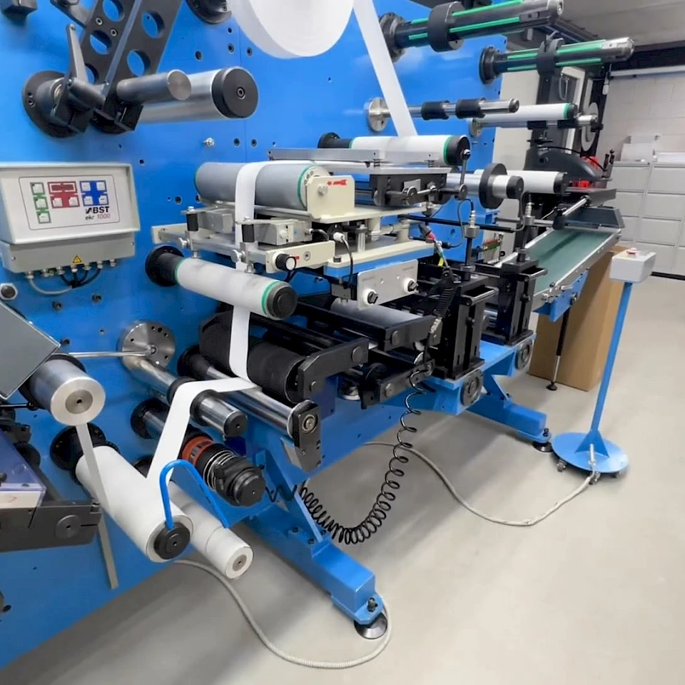 Blue rotary converting line side view in hall