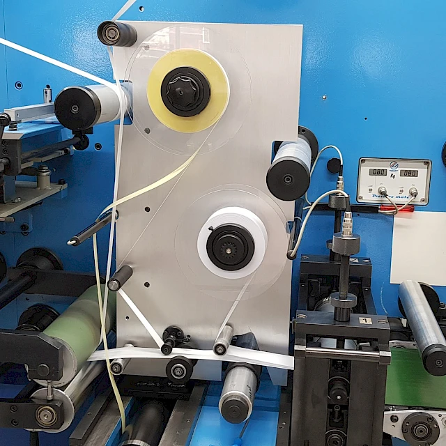 Blue rotary converting machine unwind section