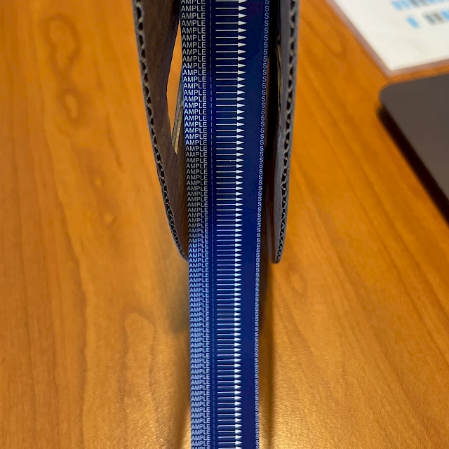 Blue sample printed tape roll edge