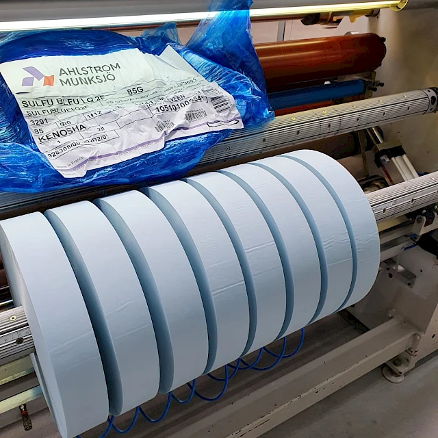 Blue slit rolls on slitter rewind shaft