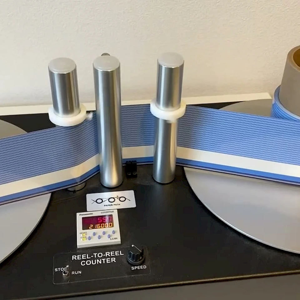 Blue tape reel to reel counter rewinding