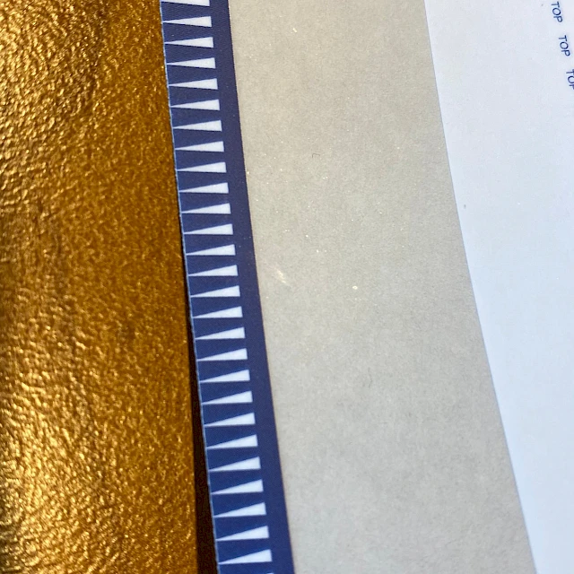 Blue teeth printed strip closeup