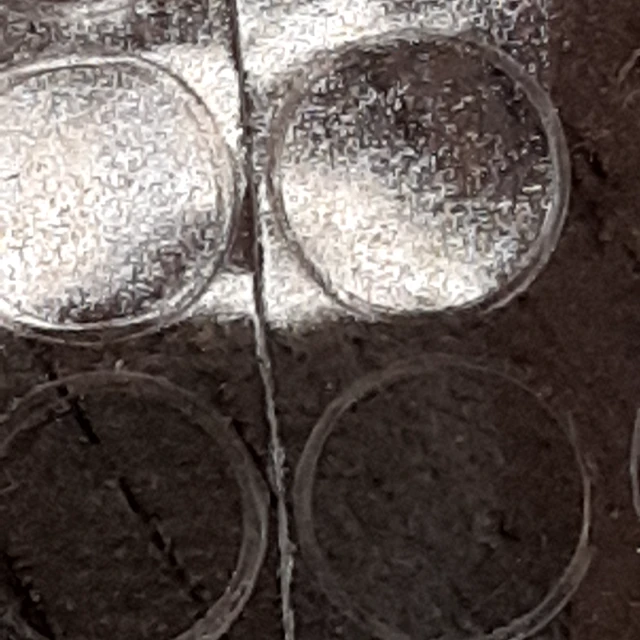 Clear round die cut discs on foil