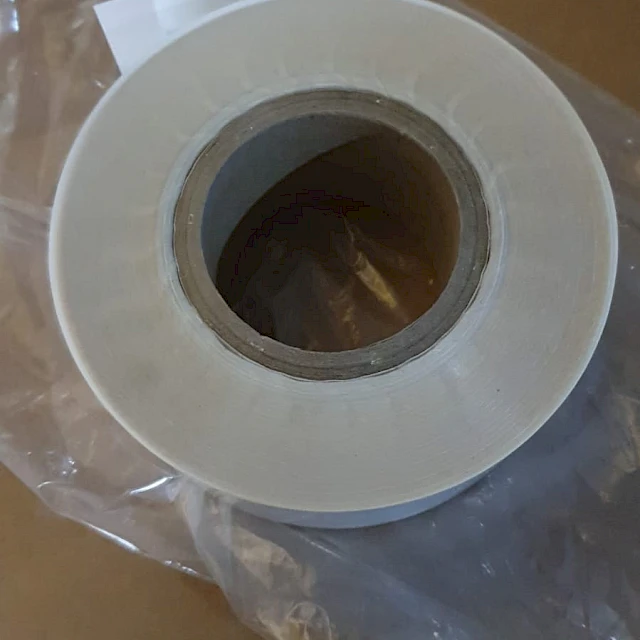 Clear tape roll in plastic