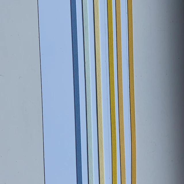 Colored laminate card edge stripes