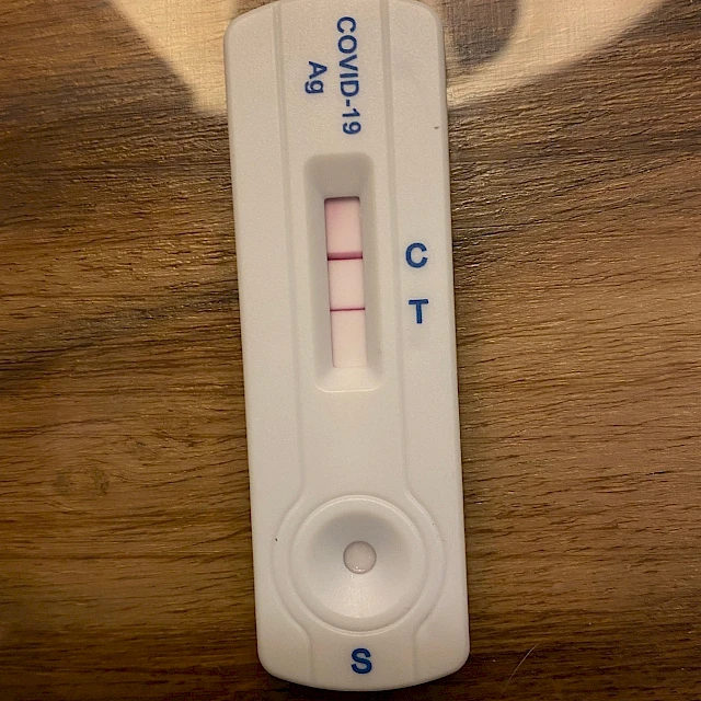 Covid 19 ag rapid test on wood table