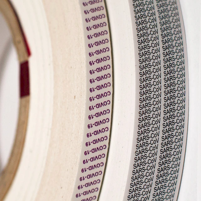 Covid 19 printed tape rolls close up