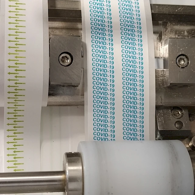 Covid 19 printed web on press