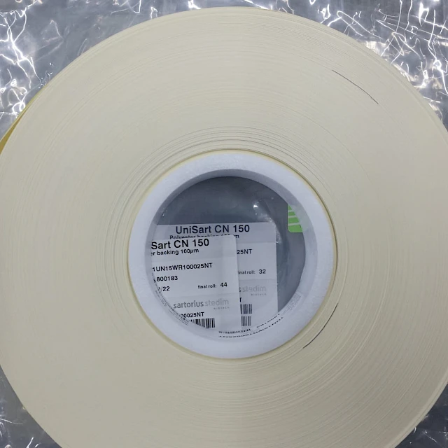 Cream adhesive tape roll in bag