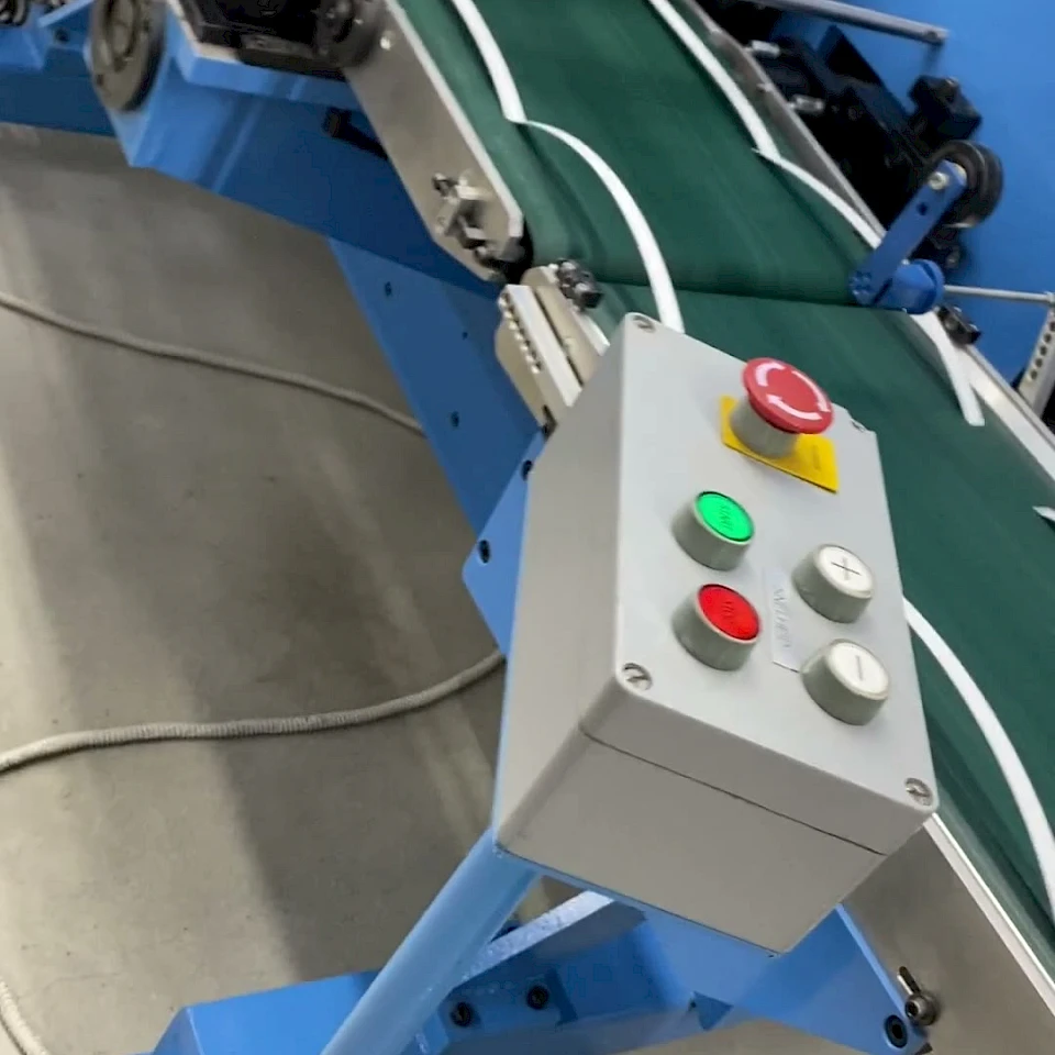 Cut strips on green conveyor with control box