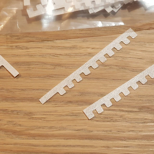 Die cut comb parts closeup