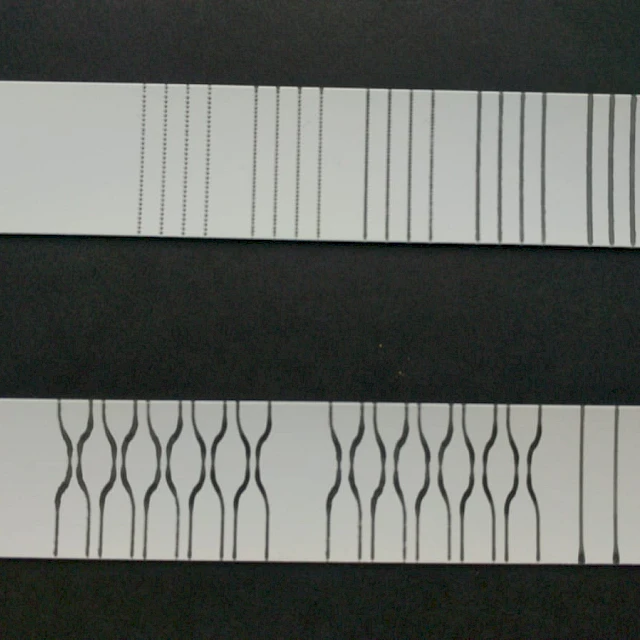 Die cut sensor pattern strips on black