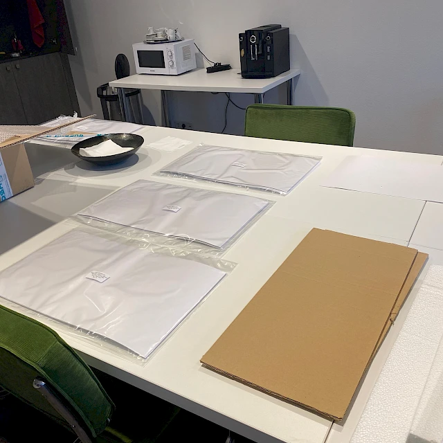 Foil pouches laid out on meeting table