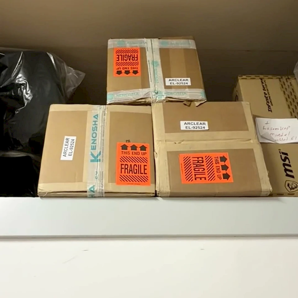 Fragile parcels on shelf