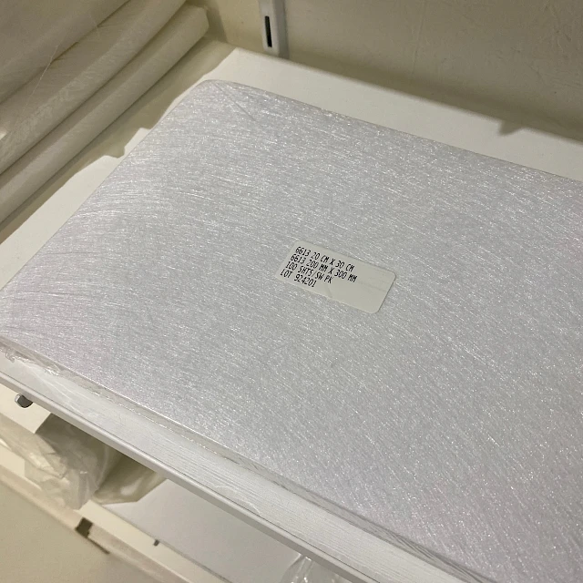 Glass fiber sheet pack on shelf