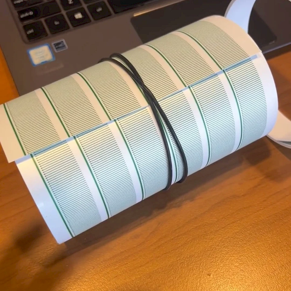 Green line printed sheets rolled with rubber band