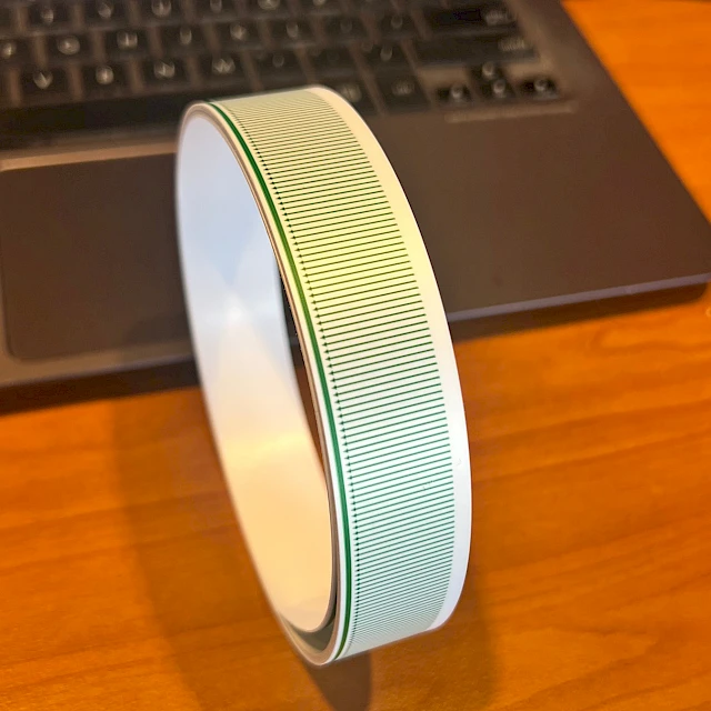 Green line printed tape roll on desk