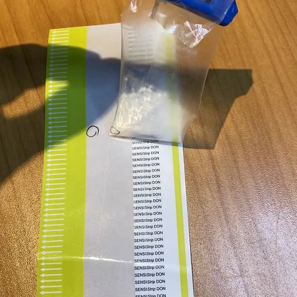 Green printed sensistrip tape with cutter knife