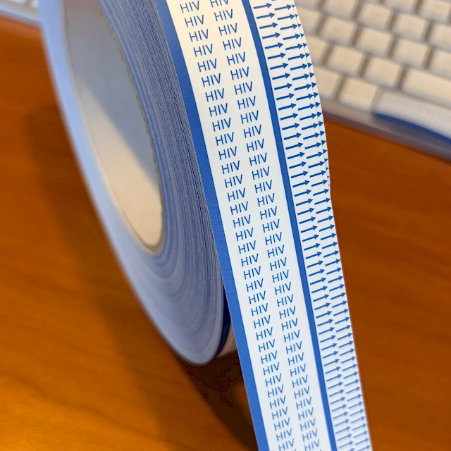 Hiv printed blue edge tape roll