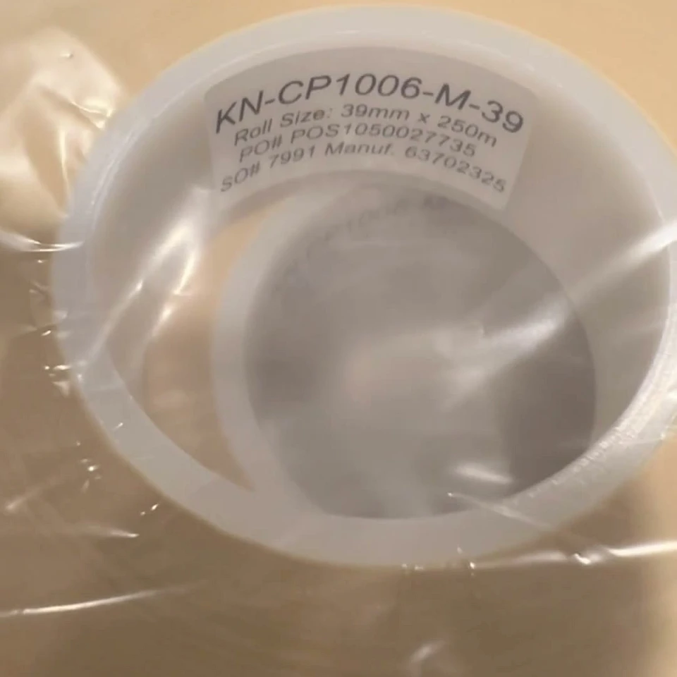 KN cp1006 clear tape roll label close up