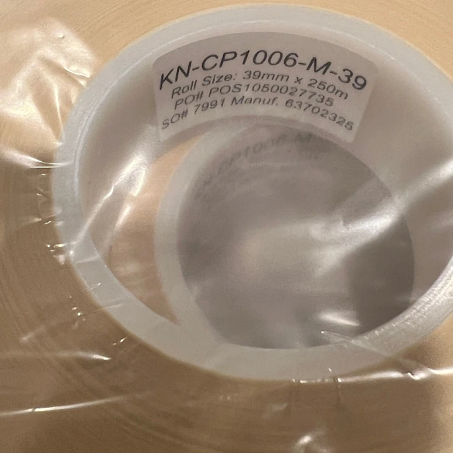 KN cp1006 clear tape roll label close up