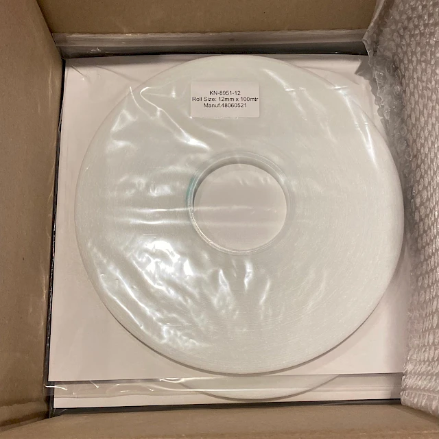 KN roll in box with bubble wrap