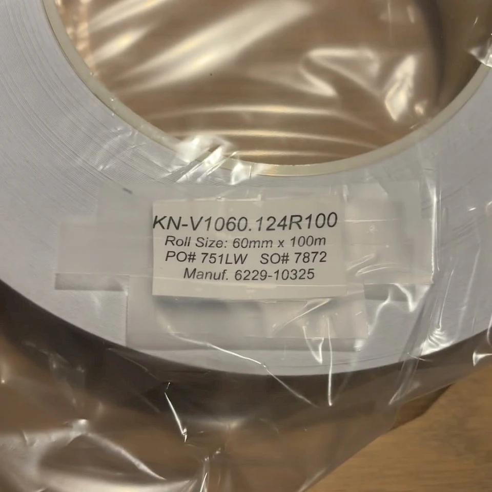 KN v1060 wrapped roll with label