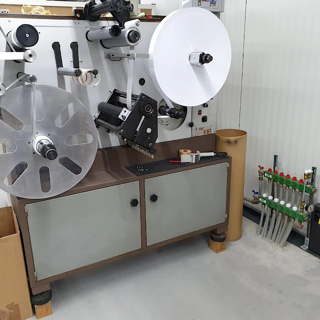 Label rewinder machine in workshop