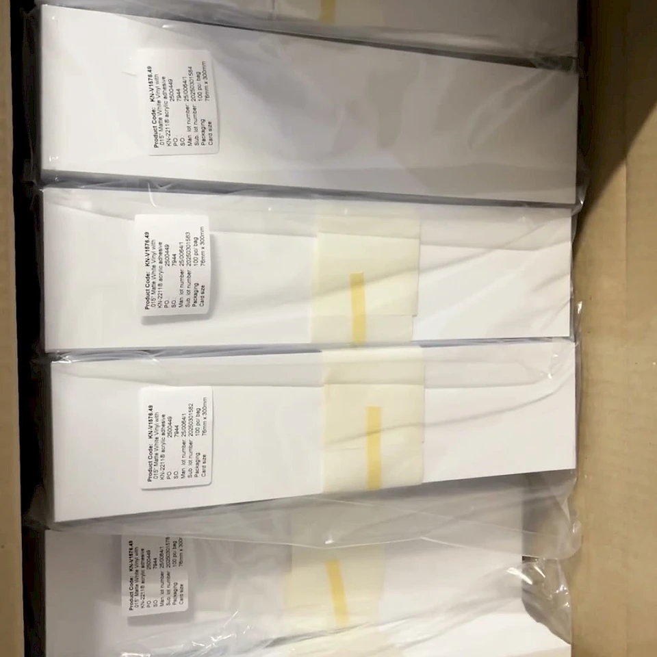 Labelled backing card bundles in carton