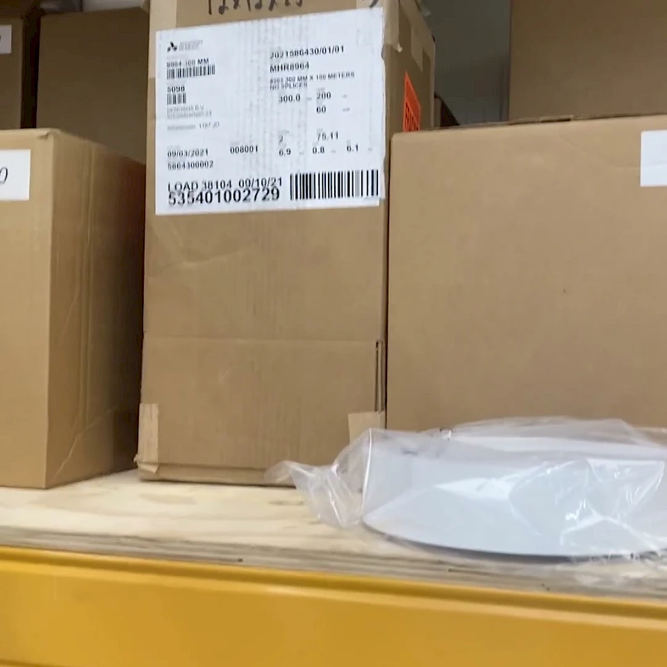 Labelled cartons and bagged roll on rack