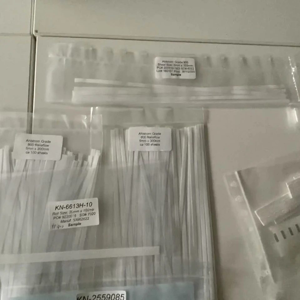 Labelled sample bags of strips on table