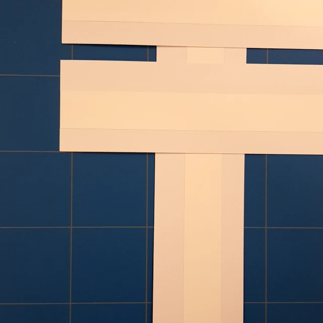 Laminated card assembly cross shape