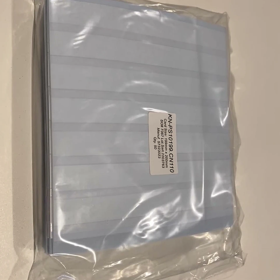 Light blue striped card sheets in bag