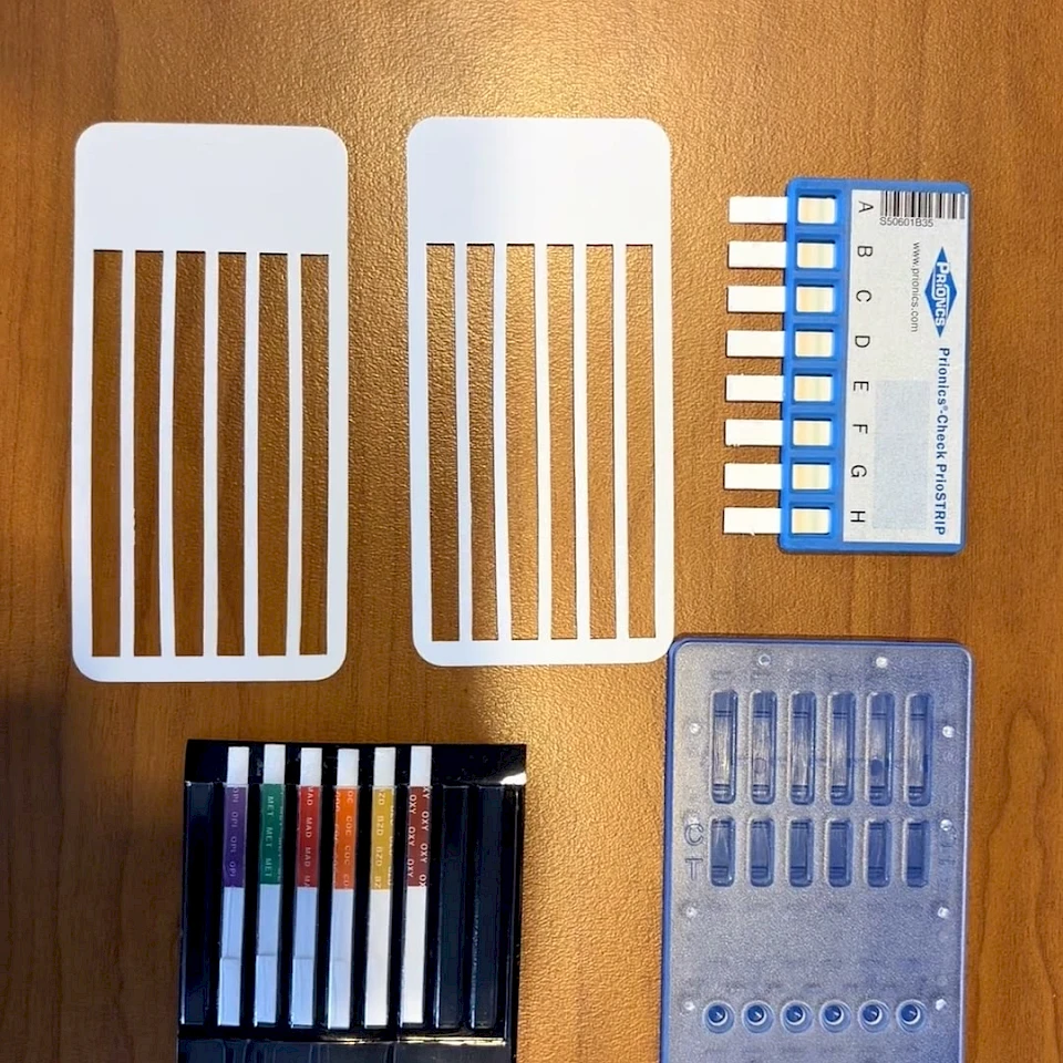 Multi strip test cassettes and card holders