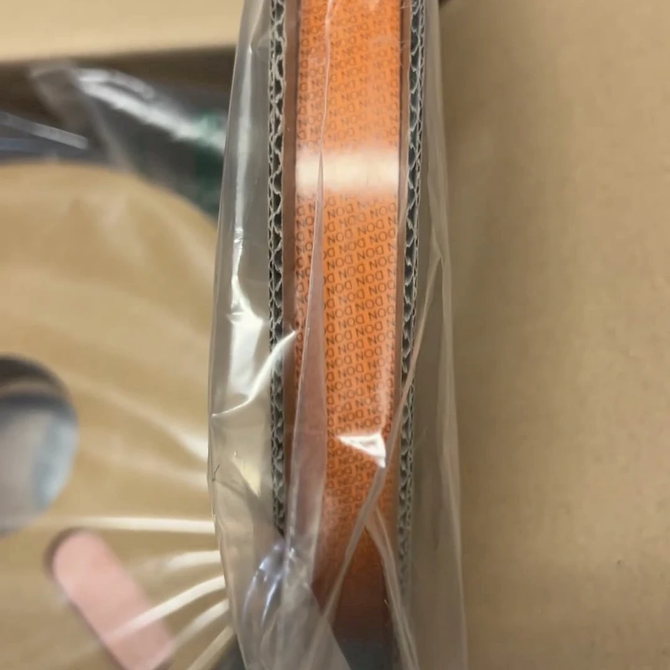 Orange tape roll edge in bag