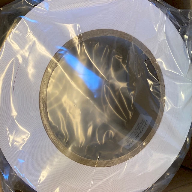 Packed white roll in cardboard box