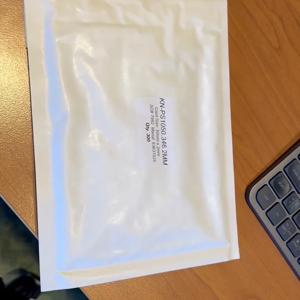 Padded envelope with product label on desk