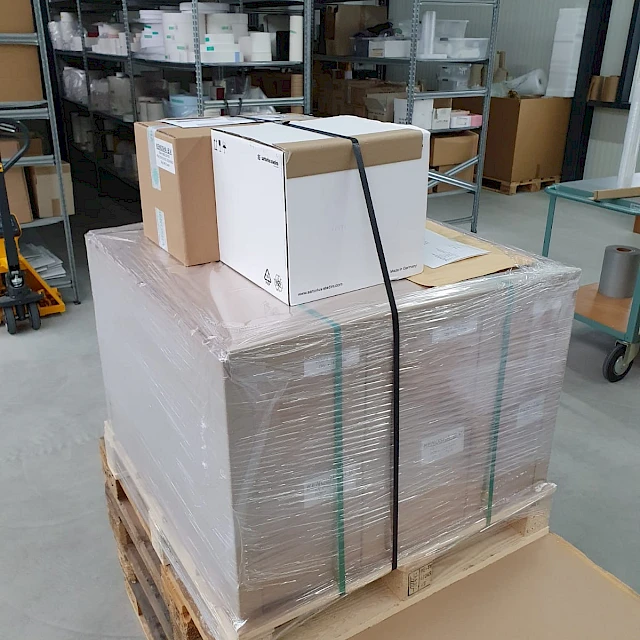 Pallet with boxes in warehouse