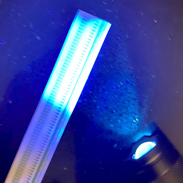 Printed strip under UV light