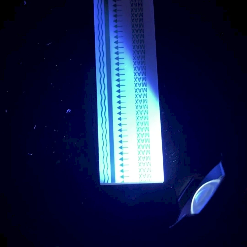 Printed strip under UV light