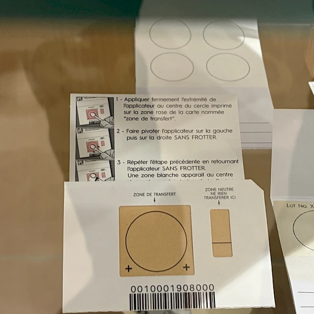 Printed transfer cards with instructions on glass