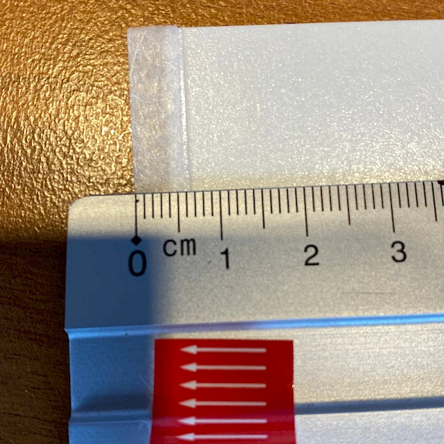 Red printed strip with ruler